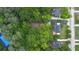 An aerial view reveals the property layout, landscaping, and neighborhood at 6104 Floyd St, Covington, GA 30014