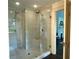 Modern bathroom featuring a glass-enclosed shower with dual shower heads at 6104 Floyd St, Covington, GA 30014