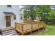 New wooden deck is the perfect spot for outdoor relaxation and entertaining at 6104 Floyd St, Covington, GA 30014