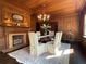 Formal dining room with wood accents, fireplace, and space for entertaining at 6104 Floyd St, Covington, GA 30014