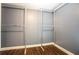 Empty walk in closet with hardwood floors and plenty of space at 704 Willowwind Dr, Loganville, GA 30052
