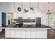 Large kitchen island with seating and granite countertop at 704 Willowwind Dr, Loganville, GA 30052