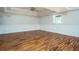 Spacious living area featuring hardwood floors, modern trim, and abundant natural light at 704 Willowwind Dr, Loganville, GA 30052