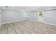 Finished basement with neutral walls, light-colored floors, and a door to the outside at 337 Liberty Dr, Acworth, GA 30102