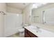 Bathroom featuring a tub, toilet, dark wood vanity, and a mirror at 337 Liberty Dr, Acworth, GA 30102