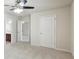 Bedroom showcasing neutral walls, carpeted floors, and access to the bathroom at 337 Liberty Dr, Acworth, GA 30102