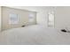 Spacious bonus room with neutral carpeting, plentiful natural light and easy access to other rooms at 337 Liberty Dr, Acworth, GA 30102