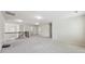 Large, light-filled bonus room with neutral walls and carpet, perfect for versatile living at 337 Liberty Dr, Acworth, GA 30102
