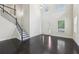 Welcoming two-story foyer featuring hardwood floors, staircase, and plenty of natural light at 337 Liberty Dr, Acworth, GA 30102