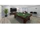 Basement game room with pool table, modern decor, and stylish bar stools for entertaining guests at 337 Liberty Dr, Acworth, GA 30102