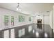 Bright living room with hardwood floors, fireplace, and access to deck at 337 Liberty Dr, Acworth, GA 30102