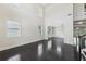 Bright, open living room with hardwood floors, high ceilings, and large windows for natural light at 337 Liberty Dr, Acworth, GA 30102