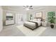 Serene main bedroom with tray ceiling, neutral tones, ensuite bathroom, and ample natural light at 337 Liberty Dr, Acworth, GA 30102