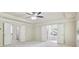 Bright main bedroom featuring trey ceilings, dual entry to ensuite bathroom, and large windows at 337 Liberty Dr, Acworth, GA 30102