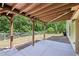 Enjoy the covered patio overlooking the fenced backyard, perfect for outdoor relaxation at 337 Liberty Dr, Acworth, GA 30102