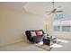 Spacious bedroom with vaulted ceiling, ceiling fan, and large arched window at 12955 Mariners Ct, Alpharetta, GA 30005