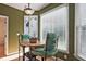 Charming breakfast nook with natural light, table, and cushioned chairs at 12955 Mariners Ct, Alpharetta, GA 30005