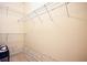 Walk-in closet with ample shelving for storage at 12955 Mariners Ct, Alpharetta, GA 30005
