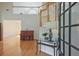 Grand foyer with hardwood floors, staircase, and natural light from the front door at 12955 Mariners Ct, Alpharetta, GA 30005