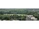 Stunning aerial view overlooking lush green trees, a recreational field and neighborhood architecture at 199 14Th St # 2502, Atlanta, GA 30309