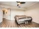A neutrally painted bedroom featuring vinyl floors and a door into another room at 199 14Th St # 2502, Atlanta, GA 30309