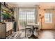 Dining area with views, bar with mini-fridge and shelving for glasses and alcohol at 199 14Th St # 2502, Atlanta, GA 30309