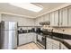Contemporary kitchen featuring stainless steel appliances and abundant cabinetry at 199 14Th St # 2502, Atlanta, GA 30309