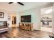 Open-concept living room showing hardwood floors and a view of the kitchen at 199 14Th St # 2502, Atlanta, GA 30309