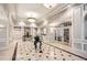 Welcoming lobby featuring marble floors, stylish decor and a concierge desk at 199 14Th St # 2502, Atlanta, GA 30309