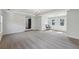 Large bedroom with ample space, a chandelier, carpet, and natural light from dual windows at 4630 Carriage Walk Ln, Cumming, GA 30040