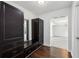 Mudroom with wood floors, custom storage cabinets, and seamless access to the house at 4630 Carriage Walk Ln, Cumming, GA 30040