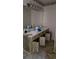 Bathroom with double sink vanity and neutral tile flooring at 65 King James Se Ct, Conyers, GA 30013