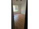 Bedroom with wood floor and window at 65 King James Se Ct, Conyers, GA 30013