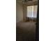 Bedroom with a window and a beige colored carpet at 65 King James Se Ct, Conyers, GA 30013