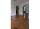 Hardwood living room featuring a unique archway between rooms at 65 King James Se Ct, Conyers, GA 30013