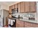 Close up of cabinets with stainless steel oven and microwave at 1345 Aster Ives Dr, Lawrenceville, GA 30045