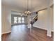 Open floorplan with hardwood floors, lots of light, and neutral colors at 1345 Aster Ives Dr, Lawrenceville, GA 30045