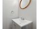 A bathroom vanity with a gray cabinet and a white sink at 213 Yuba Walk, Lawrenceville, GA 30046