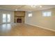 Finished basement with a stone fireplace, wood-look floors, and French doors to the outside at 3572 Dexter Way, Marietta, GA 30062