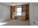 Bedroom with built-in bookshelves, desk, and a double closet at 3572 Dexter Way, Marietta, GA 30062