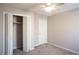 Bedroom featuring carpeted floors and a double closet at 3572 Dexter Way, Marietta, GA 30062