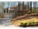 Inviting exterior view of home featuring a 2-car garage and charming front yard at 3572 Dexter Way, Marietta, GA 30062