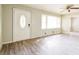 Cozy living room with luxury vinyl flooring, ample natural light, and neutral walls at 3697 Wisteria Sw Ln, Atlanta, GA 30331