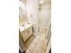 Bathroom features a tiled floor, vanity, and tiled shower/tub at 381 Fleming Ct, Jonesboro, GA 30238
