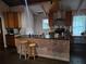 Kitchen with bar seating, stainless steel appliances, and modern countertops at 5655 Lake Forrest Dr, Atlanta, GA 30342
