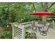 Cozy deck with seating area and lush greenery, perfect for outdoor relaxation at 725 Brown Pl, Decatur, GA 30030