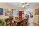 Dining room featuring a large wooden table, classic chairs, and ample natural light at 725 Brown Pl, Decatur, GA 30030