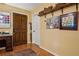 Welcoming entryway featuring a wooden door, hardwood floors, and stylish decor at 725 Brown Pl, Decatur, GA 30030