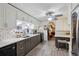 Modern kitchen featuring white cabinets, stainless steel appliances, and an open layout at 725 Brown Pl, Decatur, GA 30030