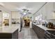 Bright kitchen featuring white cabinets, stainless steel appliances, and a stylish backsplash at 725 Brown Pl, Decatur, GA 30030